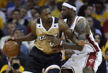 CLEVELAND - APRIL 21:  Gilbert Arenas #0 of the Washington Wizards tries to get around LeBron James #23 of the Cleveland Cavaliers in Game Two of the Eastern Conference Quarterfinals during the 2008 NBA Playoffs at Quicken Loans Arena April 21, 2008 in Cleveland, Ohio.  NOTE TO USER: User expressly acknowledges and agrees that, by downloading and or using this photograph, User is consenting to the terms and conditions of the Getty Images License Agreement.  (Photo by Gregory Shamus/Getty Images)