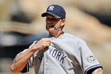 ANAHEIM, CA - SEPTEMBER 23:  Pitcher A. J. Burnett #34 of the New York Yankees adjusts his jersey on a hot afternoon during the thrid inning of the game against the Los Angeles Angels of Anaheim at Angel Stadium on September 23, 2009 in Anaheim, California.  (Photo by Kevork Djansezian/Getty Images)