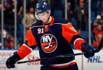 UNIONDALE, NY - OCTOBER 21:  John Tavares #91 of the New York Islanders looks on against the Carolina Hurricanes on October 21, 2009 at Nassau Coliseum in Uniondale, New York. The Isles won the game 4-3 after a shoot out.  (Photo by Jim McIsaac/Getty Images)