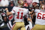 HOUSTON - OCTOBER 25:  Quarterback Alex Smith #11 of the San Francisco 49ers throws downfield at Reliant Stadium on October 25, 2009 in Houston, Texas.  (Photo by Bob Levey/Getty Images)