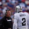 EAST RUTHERFORD, NJ - OCTOBER 11:  Head Coach Tom Cable and JaMarcus Russell #2 of the Oakland Raiders talk in between plays during the game on October 11, 2009 at Giants Stadium in East Rutherford, New Jersey.  (Photo by Jared Wickerham/Getty Images)