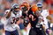 CINCINNATI - OCTOBER 25:  Cedric Benson #32 of the Cincinnati Bengals runs with the ball while defended by Danieal Manning #38 of the Chicago Bears during the NFL game at Paul Brown Stadium on October 25, 2009 in Cincinnati, Ohio.  The Bengals won 45-10.  (Photo by Andy Lyons/Getty Images)