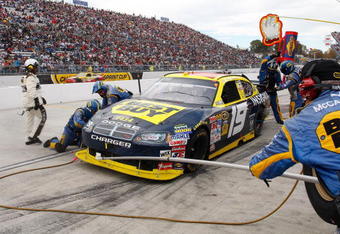 MARTINSVILLE, VA - OCTOBER 25:  Elliott Sadler, driver of the #19 Best Buy Dodge, pits during the NASCAR Sprint Cup Series TUMS Fast Relief 500 at Martinsville Speedway on October 25, 2009 in Martinsville, Virginia.  (Photo by Geoff Burke/Getty Images for NASCAR)