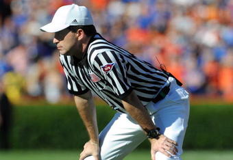 GAINESVILLE, FL - OCTOBER 17: SEC referee Marc Curles watches play as the Florida Gators host the Arkansas Razorbacks October 17, 2009 at Ben Hill Griffin Stadium in Gainesville, Florida.  (Photo by Al Messerschmidt/Getty Images)