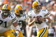 CLEVELAND, OH - OCTOBER 25:  Aaron Rodgers #12 of the Green Bay Packers drops back to pass as he gets protection from Brandon Jackson #32 and Josh Sitton #71 against the Cleveland Browns at Cleveland Browns Stadium on October 25, 2009 in Cleveland, Ohio.  (Photo by Matt Sullivan/Getty Images)