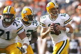 CLEVELAND, OH - OCTOBER 25:  Aaron Rodgers #12 of the Green Bay Packers drops back to pass as he gets protection from Brandon Jackson #32 and Josh Sitton #71 against the Cleveland Browns at Cleveland Browns Stadium on October 25, 2009 in Cleveland, Ohio.  (Photo by Matt Sullivan/Getty Images)