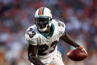 MIAMI - OCTOBER 25: Running back Ronnie Brown #23 of the Miami Dolphins looks for room to run while taking on the New Orleans Saints at Land Shark Stadium on October 25, 2009 in Miami, Florida. The Saints defeated the Dolphins 46-34. (Photo by Doug Benc/Getty Images)