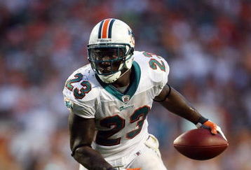 MIAMI - OCTOBER 25:  Running back Ronnie Brown #23 of the Miami Dolphins looks for room to run while taking on the New Orleans Saints at Land Shark Stadium on October 25, 2009 in Miami, Florida. The Saints defeated the Dolphins 46-34.  (Photo by Doug Benc/Getty Images)