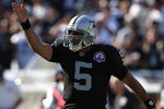 OAKLAND, CA - OCTOBER 25: Bruce Gradkowski #5 of the Oakland Raiders celebrates after getting a first down against the New York Jets during an NFL game at the Oakland-Alameda County Coliseum on October 25, 2009 in Oakland, California. (Photo by Jed Jacobsohn/Getty Images)