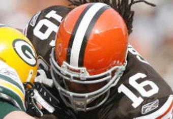 CLEVELAND, OH - OCTOBER 25:  Joshua Cribbs #16 of the Cleveland Browns is hit by A.J. Hawk #50 and Clay Matthews #52 of the Green Bay Packers at Cleveland Browns at Cleveland Browns Stadium on October 25, 2009 in Cleveland, Ohio.  (Photo by Matt Sullivan/Getty Images)
