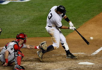 NEW YORK - OCTOBER 25:  Alex Rodriguez #13 of the New York Yankees singles to centerfield in the bottom of the seventh inning against the Los Angeles Angels of Anaheim in Game Six of the ALCS during the 2009 MLB Playoffs at Yankee Stadium on October 25, 2009 in the Bronx borough of New York City.  (Photo by Jim McIsaac/Getty Images)