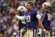 SEATTLE - OCTOBER 24:  Quarterback Jake Locker #10 of the Washington Huskies pleads for a penalty after having his helmut ripped off on a running play against the Oregon Ducks on October 24, 2009 at Husky Stadium in Seattle, Washington. No penalty was called on the play, and the Ducks defeated the Huskies 43-19. (Photo by Otto Greule Jr/Getty Images)