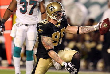 MIAMI - OCTOBER 25:  Tight end Jeremy Shockey #88 of the New Orleans Saints celebrates after making a first down reception over safety Yeremiah Bell #37 of the Miami Dolphins at Land Shark Stadium on October 25, 2009 in Miami, Florida. The Saints defeated the Dolphins 46-34.  (Photo by Doug Benc/Getty Images)