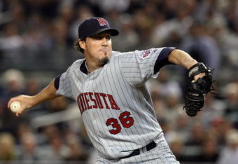 NEW YORK - OCTOBER 09:  Joe Nathan #36 of the Minnesota Twins pitches against the New York Yankees in Game Two of the ALDS during the 2009 MLB Playoffs at Yankee Stadium on October 9, 2009 in the Bronx borough of New York City.  (Photo by Jim McIsaac/Getty Images)