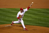 PHILADELPHIA - OCTOBER 18:  Cliff Lee #34 of the Philadelphia Phillies pitches against the Los Angeles Dodgers during Game Three of the NLCS during the 2009 MLB Playoffs at Citizens Bank Park on October 18, 2009 in Philadelphia, Pennsylvania.  (Photo by Chris McGrath/Getty Images)