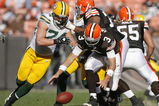 CLEVELAND, OH - OCTOBER 25:  Derek Anderson #3 of the Cleveland Browns fights for a fumble with Aaron Kampman #74 the Green Bay Packers at Cleveland Browns at Cleveland Browns Stadium on October 25, 2009 in Cleveland, Ohio.  (Photo by Matt Sullivan/Getty Images)