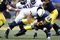 ANN ARBOR, MI - OCTOBER 24:  Tate Forcier #5 of the Michigan Wolverines gets taken down for a sack by Josh Hull #43 of the Penn State Nittany Lions on October 24, 2009 at Michigan Stadium in Ann Arbor, Michigan.  (Photo by Gregory Shamus/Getty Images)