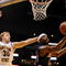 LOS ANGELES, CA - MARCH 12: Guard Nic Wise #13 of the Arizona Wildcats takes a shot as Rihards Kuksiks #30 of the Arizona State Sun Devils defends during the Pacific Life Pac-10 Men's Basketball Tournament at the Staples Center on March 12, 2009 in Los Angeles, California. (Photo by Harry How/Getty Images)