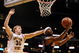 LOS ANGELES, CA - MARCH 12: Guard Nic Wise #13 of the Arizona Wildcats takes a shot as Rihards Kuksiks #30 of the Arizona State Sun Devils defends during the Pacific Life Pac-10 Men's Basketball Tournament at the Staples Center on March 12, 2009 in Los Angeles, California. (Photo by Harry How/Getty Images)
