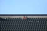 OAKLAND, CA - OCTOBER 25: Fans of the Oakland Raiders look on against the New York Jets during an NFL game at the Oakland-Alameda County Coliseum on October 25, 2009 in Oakland, California. (Photo by Jed Jacobsohn/Getty Images)