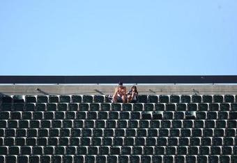 OAKLAND, CA - OCTOBER 25: Fans of the Oakland Raiders look on against the New York Jets during an NFL game at the Oakland-Alameda County Coliseum on October 25, 2009 in Oakland, California. (Photo by Jed Jacobsohn/Getty Images)