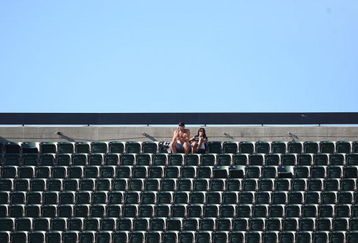OAKLAND, CA - OCTOBER 25: Fans of the Oakland Raiders look on against the New York Jets during an NFL game at the Oakland-Alameda County Coliseum on October 25, 2009 in Oakland, California. (Photo by Jed Jacobsohn/Getty Images)