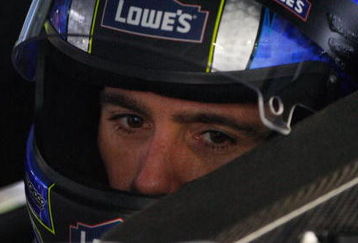 CONCORD, NC - OCTOBER 16:  Jimmie Johnson, driver of the #48 Lowe's Chevrolet, sits in his car during practice for the NASCAR Sprint Cup Series NASCAR Banking 500 at Lowe's Motor Speedway on October 16, 2009 in Concord, North Carolina.  (Photo by Geoff Burke/Getty Images for NASCAR)
