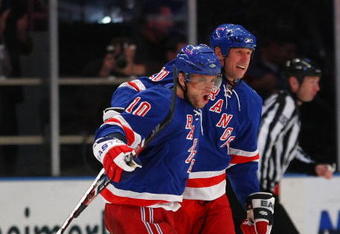 NEW YORK - OCTOBER 14: (L-R) Marian Gaborik #10 and Vinny Prospal #20 of the New York Rangers celebrate a goal against the Los Angeles Kings at Madison Square Garden on October 14, 2009 in New York, New York. The Rangers defeated the Kings 5-4.  (Photo by Bruce Bennett/Getty Images)