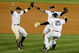 NEW YORK - OCTOBER 25: Alex Rodriguez #13, Derek Jeter #2 and Mark Teixeira #25 of the New York Yankees celebrate their 5-2 victory over the Los Angeles Angels of Anaheim at the end of the top of the ninth inning in Game Six of the ALCS during the 2009 MLB Playoffs at Yankee Stadium on October 25, 2009 in the Bronx borough of New York City. The New York Yankees won the ALCS series 4-2 over the Los Angeles Angels of Anaheim to capture the American League pennant. (Photo by Jim McIsaac/Getty Images)