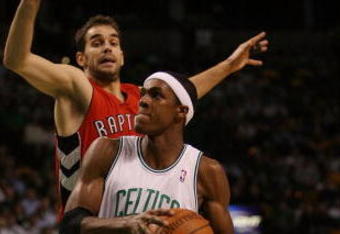 BOSTON - NOVEMBER 10: Rajon Rondo #9 of the Boston Celtics drives to the net as Jose Calderon #8 of the Toronto Raptors defends on November 10,  2008 at TD Banknorth Garden in Boston, Massachusetts.  NOTE TO USER: User expressly acknowledges and agrees that, by downloading and/or using this Photograph, user is consenting to the terms and conditions of the Getty Images License Agreement.  (Photo by Elsa/Getty Images)