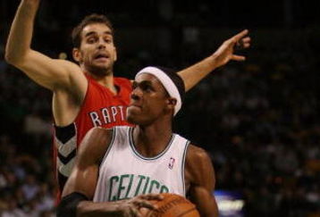 BOSTON - NOVEMBER 10: Rajon Rondo #9 of the Boston Celtics drives to the net as Jose Calderon #8 of the Toronto Raptors defends on November 10,  2008 at TD Banknorth Garden in Boston, Massachusetts.  NOTE TO USER: User expressly acknowledges and agrees that, by downloading and/or using this Photograph, user is consenting to the terms and conditions of the Getty Images License Agreement.  (Photo by Elsa/Getty Images)