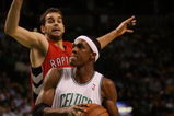 BOSTON - NOVEMBER 10: Rajon Rondo #9 of the Boston Celtics drives to the net as Jose Calderon #8 of the Toronto Raptors defends on November 10,  2008 at TD Banknorth Garden in Boston, Massachusetts.  NOTE TO USER: User expressly acknowledges and agrees that, by downloading and/or using this Photograph, user is consenting to the terms and conditions of the Getty Images License Agreement.  (Photo by Elsa/Getty Images)