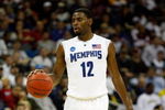 KANSAS CITY, MO - MARCH 21:  Tyreke Evans #12 of the Memphis Tigers looks to set up the play on the dribble during their second round game against the Maryland Terrapins in the NCAA Division I Men's Basketball Tournament at the Sprint Center on March 21, 2009 in Kansas City, Missouri. The Tigers defeated the Terrapins 89-70.  (Photo by Jamie Squire/Getty Images)