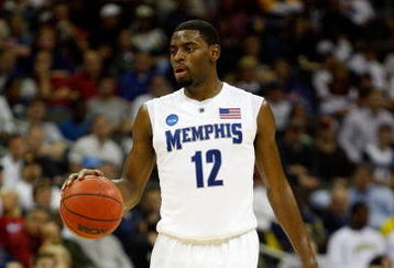 KANSAS CITY, MO - MARCH 21:  Tyreke Evans #12 of the Memphis Tigers looks to set up the play on the dribble during their second round game against the Maryland Terrapins in the NCAA Division I Men's Basketball Tournament at the Sprint Center on March 21, 2009 in Kansas City, Missouri. The Tigers defeated the Terrapins 89-70.  (Photo by Jamie Squire/Getty Images)