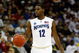 KANSAS CITY, MO - MARCH 21:  Tyreke Evans #12 of the Memphis Tigers looks to set up the play on the dribble during their second round game against the Maryland Terrapins in the NCAA Division I Men's Basketball Tournament at the Sprint Center on March 21, 2009 in Kansas City, Missouri. The Tigers defeated the Terrapins 89-70.  (Photo by Jamie Squire/Getty Images)