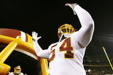 LANDOVER, MD - OCTOBER 26:  Linebacker H.B. Blades #54 of the Washington Redskins acknowledges the crowd during team introductions before the game against the Philadelphia Eagles at FedEx Field October 26, 2009 in Landover, Maryland. (Photo by Win McNamee/Getty Images)