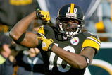 PITTSBURGH - OCTOBER 25: Santonio Holmes #10 of the Pittsburgh Steelers celebrates a play against the Minnesota Vikings  at Heinz Field on October 25, 2009 in Pittsburgh, Pennsylvania.Pittsburgh won 27-17. (Photo by Rick Stewart/Getty Images)