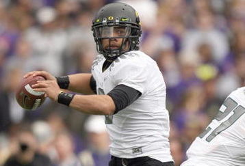 SEATTLE - OCTOBER 24: Quarterback Jeremiah Masoli #8 of the Oregon Ducks looks to pass the ball during the game against the Washington Huskies on October 24, 2009 at Husky Stadium in Seattle, Washington. The Ducks defeated the Huskies 43-19. (Photo by Otto Greule Jr/Getty Images)