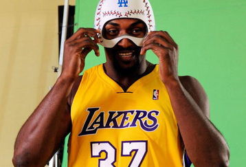 EL SEGUNDO, CA - SEPTEMBER 29: Ron Artest #37 of the Los Angeles Lakers hwears a mask while taping a public announcement for the Los Angeles Dodgers during Lakers media day at the Lakers training facility on September 29, 2009 in El Segundo, California. NOTE TO USER: User expressly acknowledges and agrees that, by downloading and/or using this Photograph, user is consenting to the terms and conditions of the Getty Images License Agreement.  (Photo by Kevork Djansezian/Getty Images)