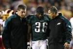 LANDOVER, MD - OCTOBER 26:  Brian Westbrook #36 of the Philadelphia Eagles is escorted off the field after getting hit during the first quarter of the game against the Washington Redskins at FedEx Field October 26, 2009 in Landover, Maryland. (Photo by Win McNamee/Getty Images)