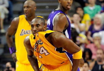 LAS VEGAS - OCTOBER 15:  Kobe Bryant #24 of the Los Angeles Lakers chews on his jersey as he plays defense against the Sacramento Kings during their preseason game at the Thomas & Mack Center October 15, 2009 in Las Vegas, Nevada. NOTE TO USER: User expressly acknowledges and agrees that, by downloading and/or using this Photograph, user is consenting to the terms and conditions of the Getty Images License Agreement.  (Photo by Ethan Miller/Getty Images)