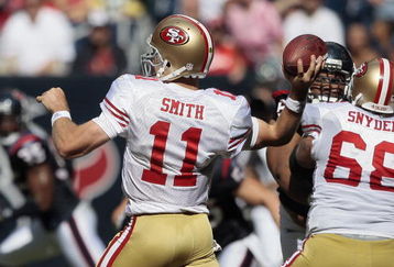 HOUSTON - OCTOBER 25:  Quarterback Alex Smith #11 of the San Francisco 49ers throws downfield at Reliant Stadium on October 25, 2009 in Houston, Texas.  (Photo by Bob Levey/Getty Images)