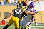 PITTSBURGH - OCTOBER 25: Brett Favre #4 of the Minnesota Vikings is trapped by LaMarr Woodley #56 and James Harrison #92 of the Pittsburgh Steelers at Heinz Field on October 25, 2009 in Pittsburgh, Pennsylvania.  (Photo by Rick Stewart/Getty Images)