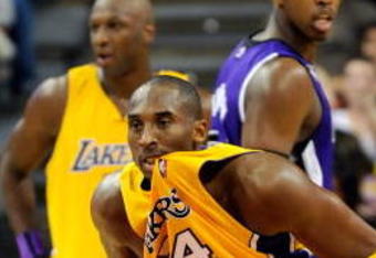 LAS VEGAS - OCTOBER 15:  Kobe Bryant #24 of the Los Angeles Lakers chews on his jersey as he plays defense against the Sacramento Kings during their preseason game at the Thomas & Mack Center October 15, 2009 in Las Vegas, Nevada. NOTE TO USER: User expressly acknowledges and agrees that, by downloading and/or using this Photograph, user is consenting to the terms and conditions of the Getty Images License Agreement.  (Photo by Ethan Miller/Getty Images)