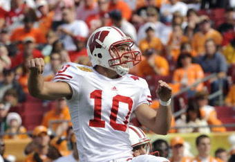 TAMPA, FL -  JANUARY 1: Kicker Taylor Mehlhaff #10 of the Wisconsin Badgers follows through on a field goal against the Tennessee Volunteers in the 2008 Outback Bowl at Raymond James Stadium on January 1, 2008 in Tampa, Florida.  The Volunteers won 21 - 17. (Photo by Al Messerschmidt/Getty Images)