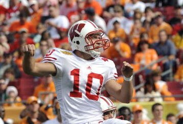 TAMPA, FL -  JANUARY 1: Kicker Taylor Mehlhaff #10 of the Wisconsin Badgers follows through on a field goal against the Tennessee Volunteers in the 2008 Outback Bowl at Raymond James Stadium on January 1, 2008 in Tampa, Florida.  The Volunteers won 21 - 17. (Photo by Al Messerschmidt/Getty Images)