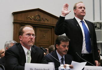 WASHINGTON - MARCH 17:  Boston Red Sox pitcher Curt Schilling (R) is sworn in while former major league player Mark McGwire (L) and Baltimore Oriole Rafael Palmeiro listen during a House Committe session investigating Major League Baseball's effort to eradicate steroid use on Capital Hill March 17, 2005 in Washington, DC. Major League Baseball (MLB) Commissioner Allen 'Bud' Selig will give testimony regarding MLB?s efforts to eradicate steriod usage among its players. (Photo by Mark Wilson/Getty Images)