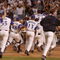 4 Nov 2001: The Arizona Diamondbacks stream onto the field after beating the New York Yankees in game seven of the Major League Baseball World Series at Bank One Ballpark in Phoenix, Arizona. The Diamondbacks won 3-2 to capture the World Series title. DIGITAL IMAGE. Mandatory Credit: Harry How/ALLSPORT