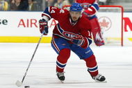 TORONTO, ON - OCTOBER 1:  Tomas Plekanec #14 of the Montreal Canadiens skates with the puck in a game against the Toronto Maple Leafs on October 1, 2009 at the Air Canada Centre in Toronto, Ontario. The Canadiens dfeated the Leafs 4-3 in overtime. (Photo by Claus Andersen/Getty Images)