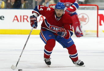 TORONTO, ON - OCTOBER 1:  Tomas Plekanec #14 of the Montreal Canadiens skates with the puck in a game against the Toronto Maple Leafs on October 1, 2009 at the Air Canada Centre in Toronto, Ontario. The Canadiens dfeated the Leafs 4-3 in overtime. (Photo by Claus Andersen/Getty Images)